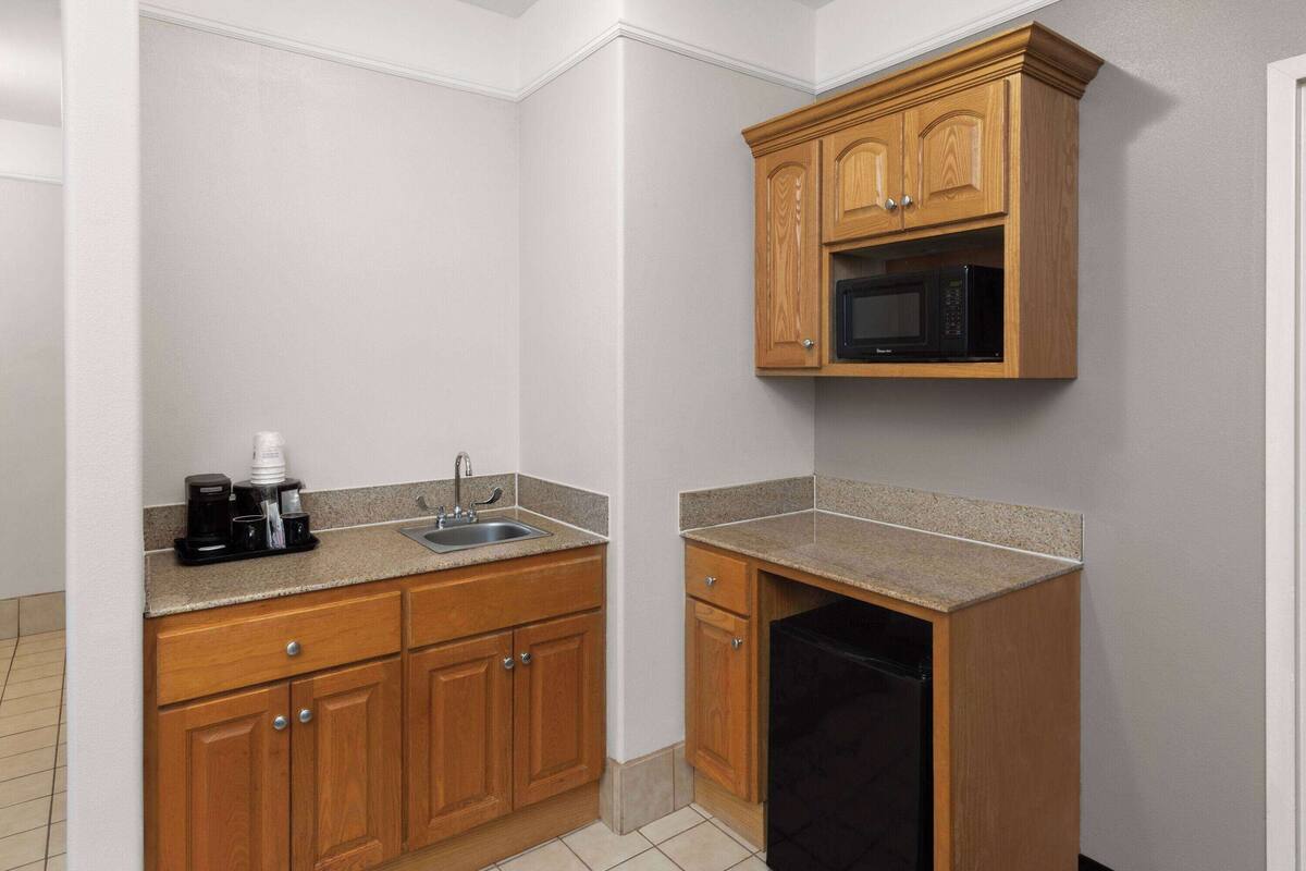 premium bedding, desk, blackout curtains, iron/ironing board