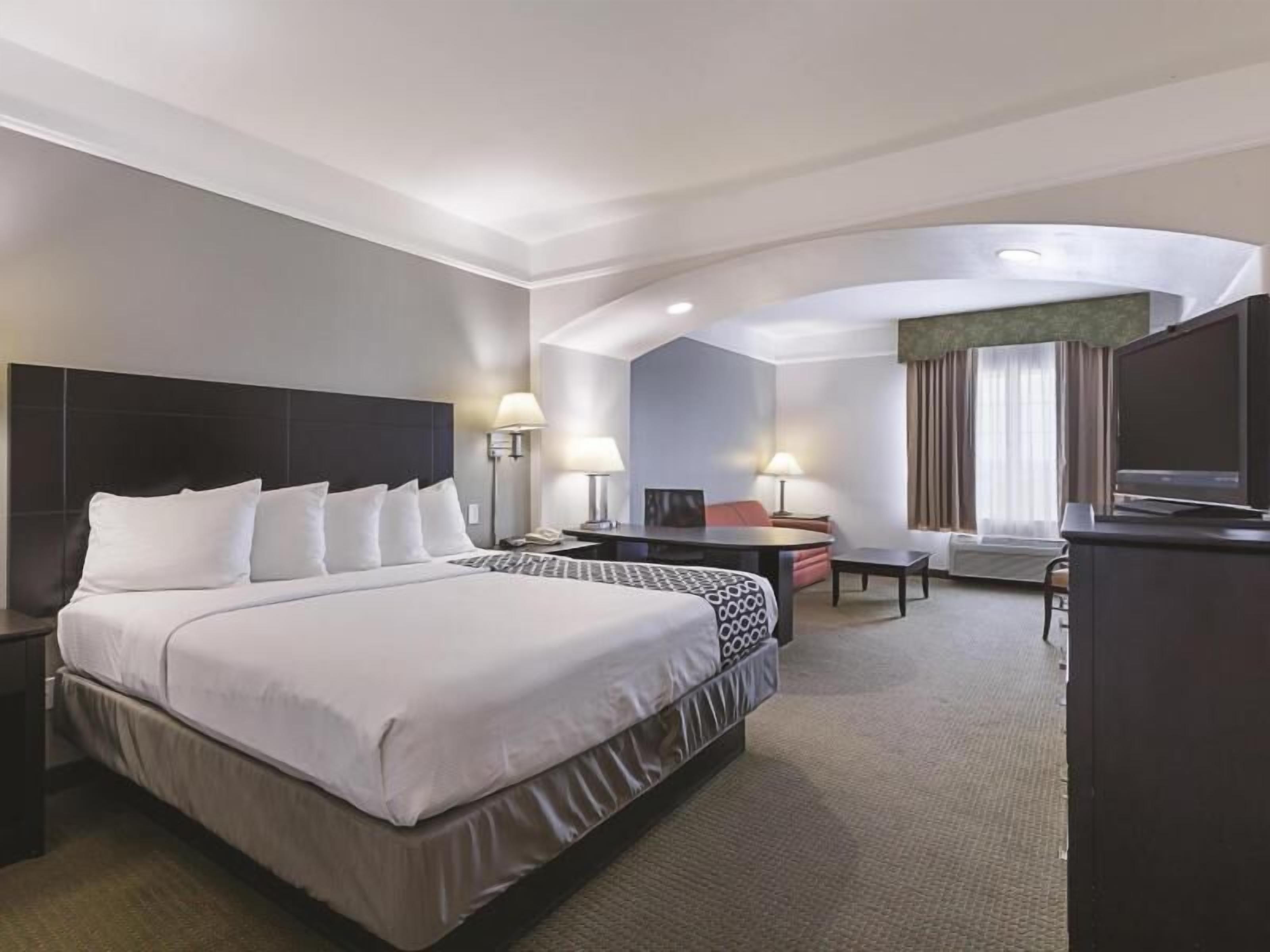 Premium bedding, desk, blackout curtains, iron/ironing board