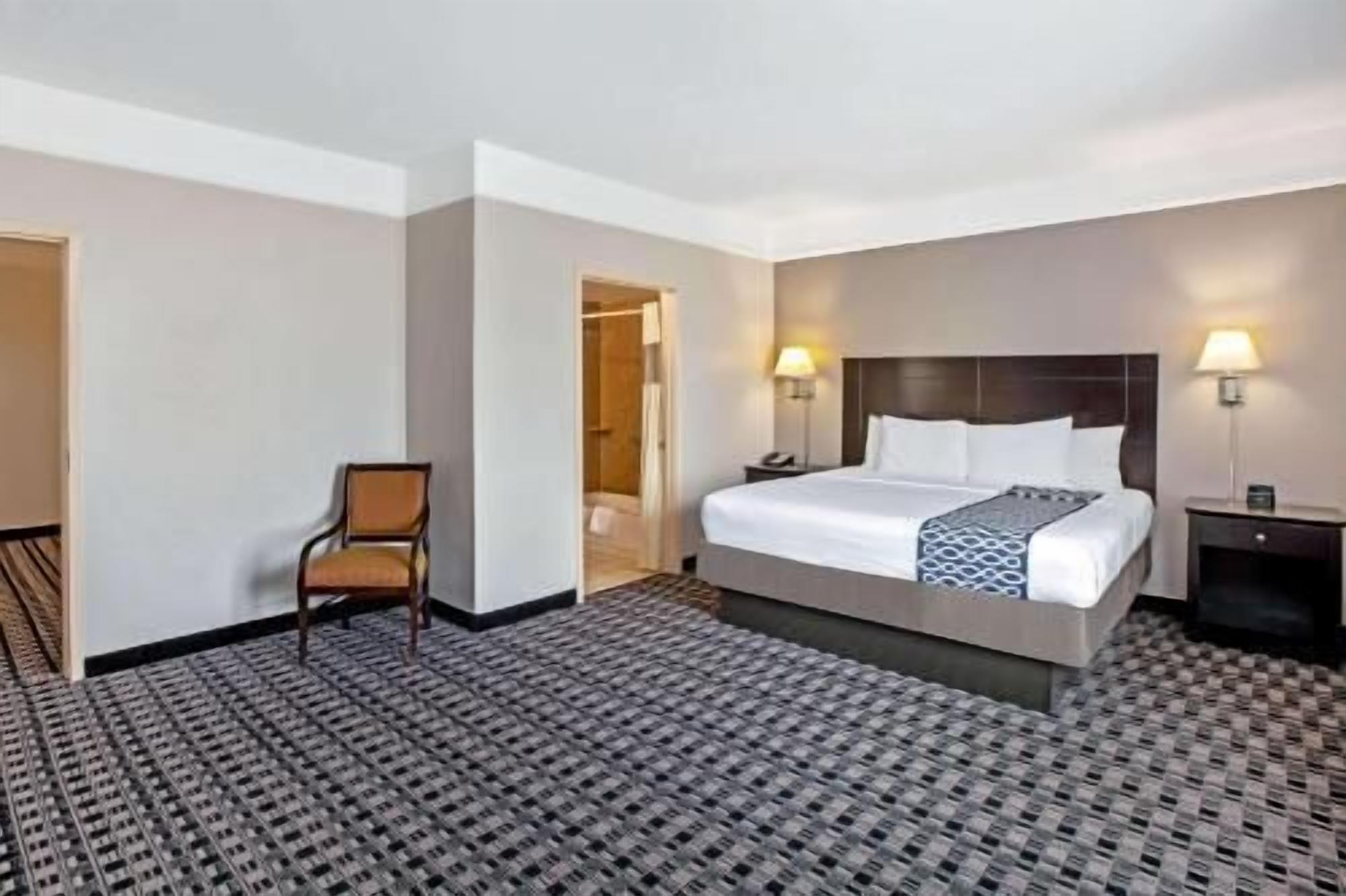 Premium bedding, desk, blackout curtains, iron/ironing board