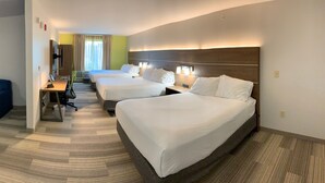 A hotel room with two beds, a desk, a chair, and a couch. - Holiday Inn Express Hotel & Suites Memphis/Germantown by IHG (Germantown)