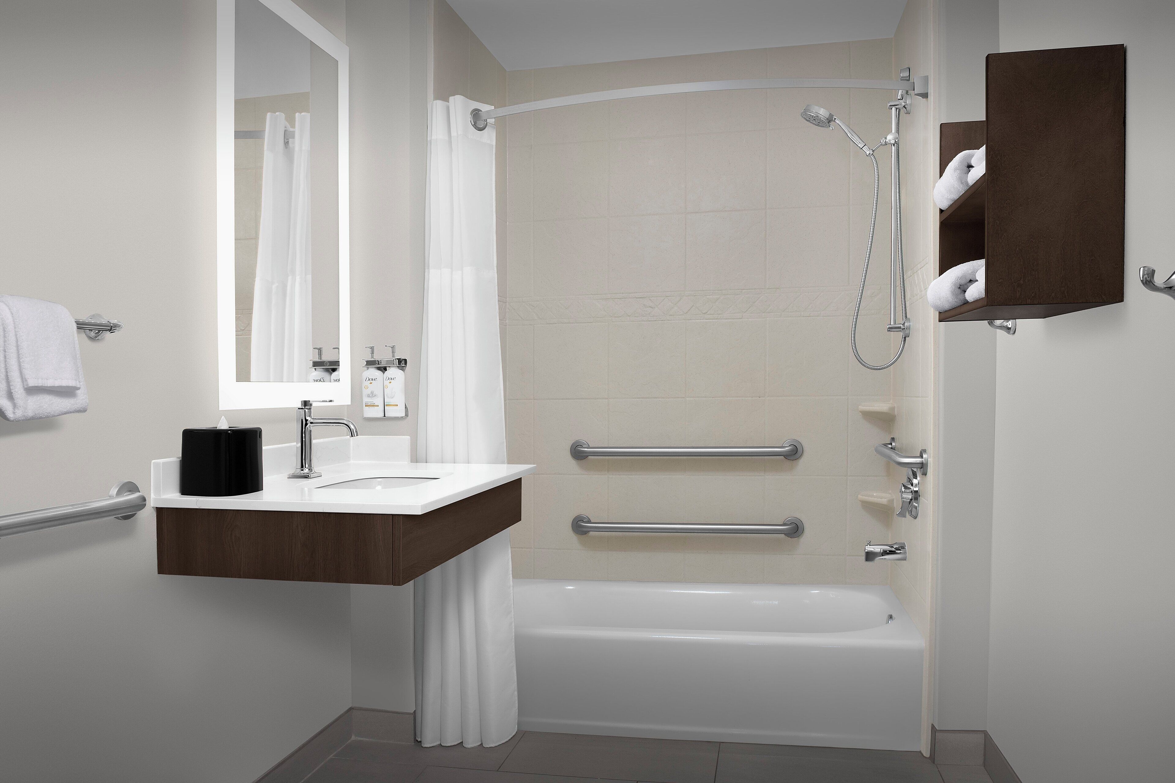 studio suite, 1 king bed, accessible, kitchen (accessible tub) | bathroom | free toiletries, hair dryer, towels, soap