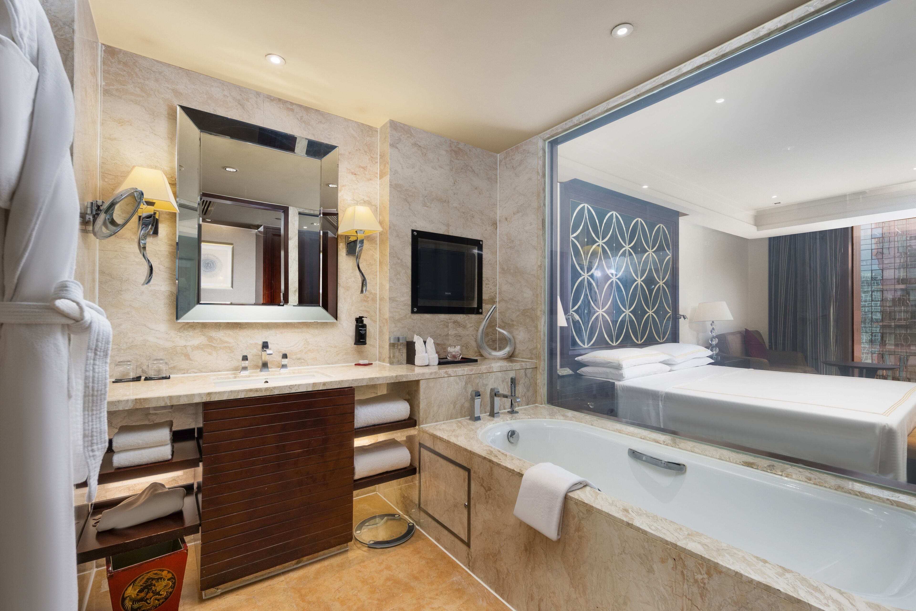 separate bathtub and shower, rainfall showerhead, designer toiletries