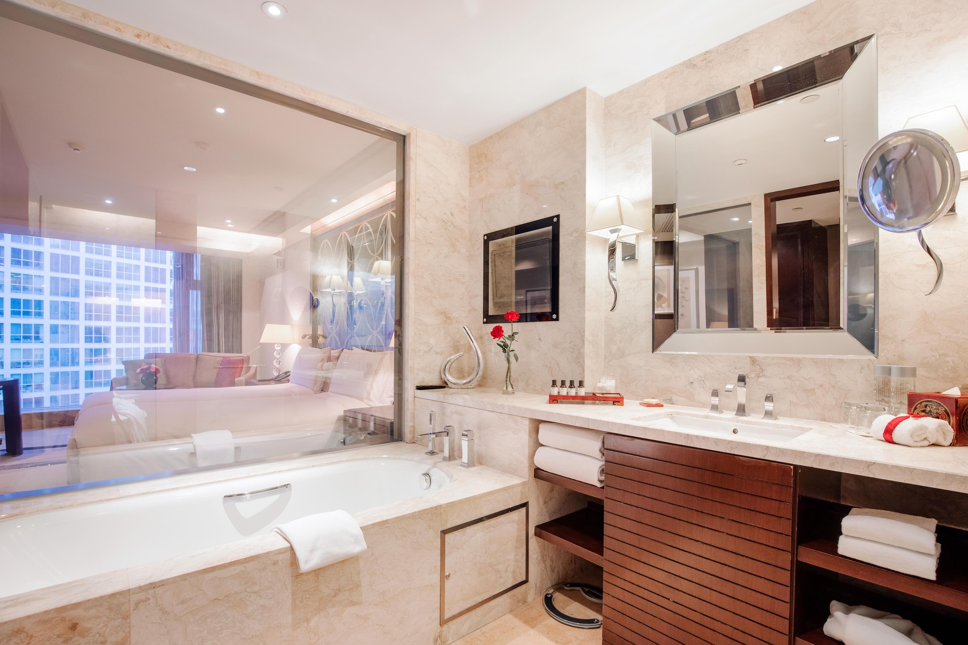 separate bathtub and shower, rainfall showerhead, designer toiletries