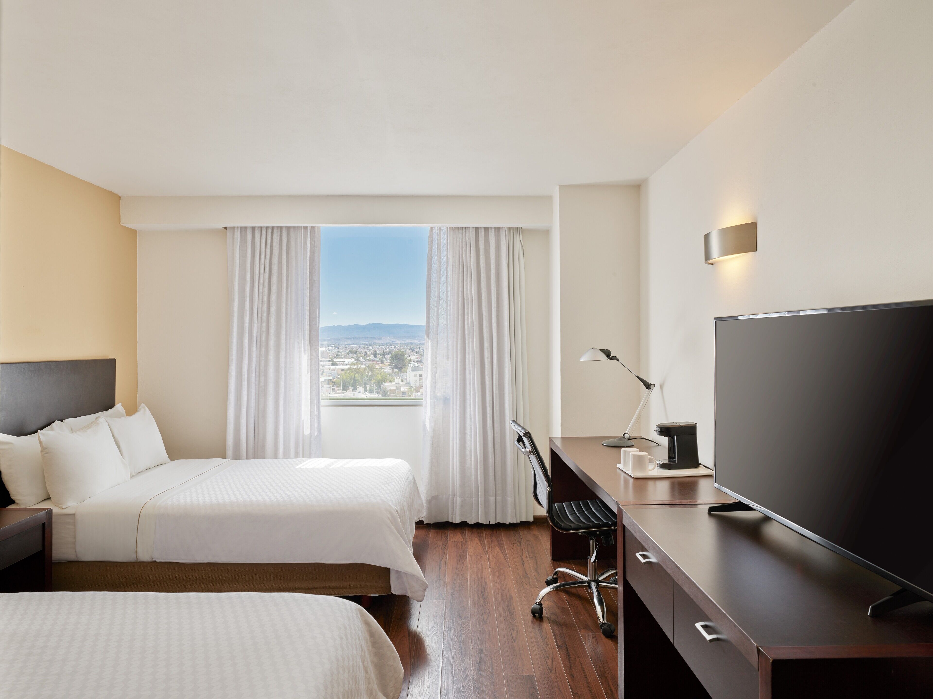 In-room safe, desk, laptop workspace, iron/ironing board