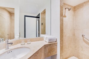 Shower, eco-friendly toiletries, hair dryer, towels