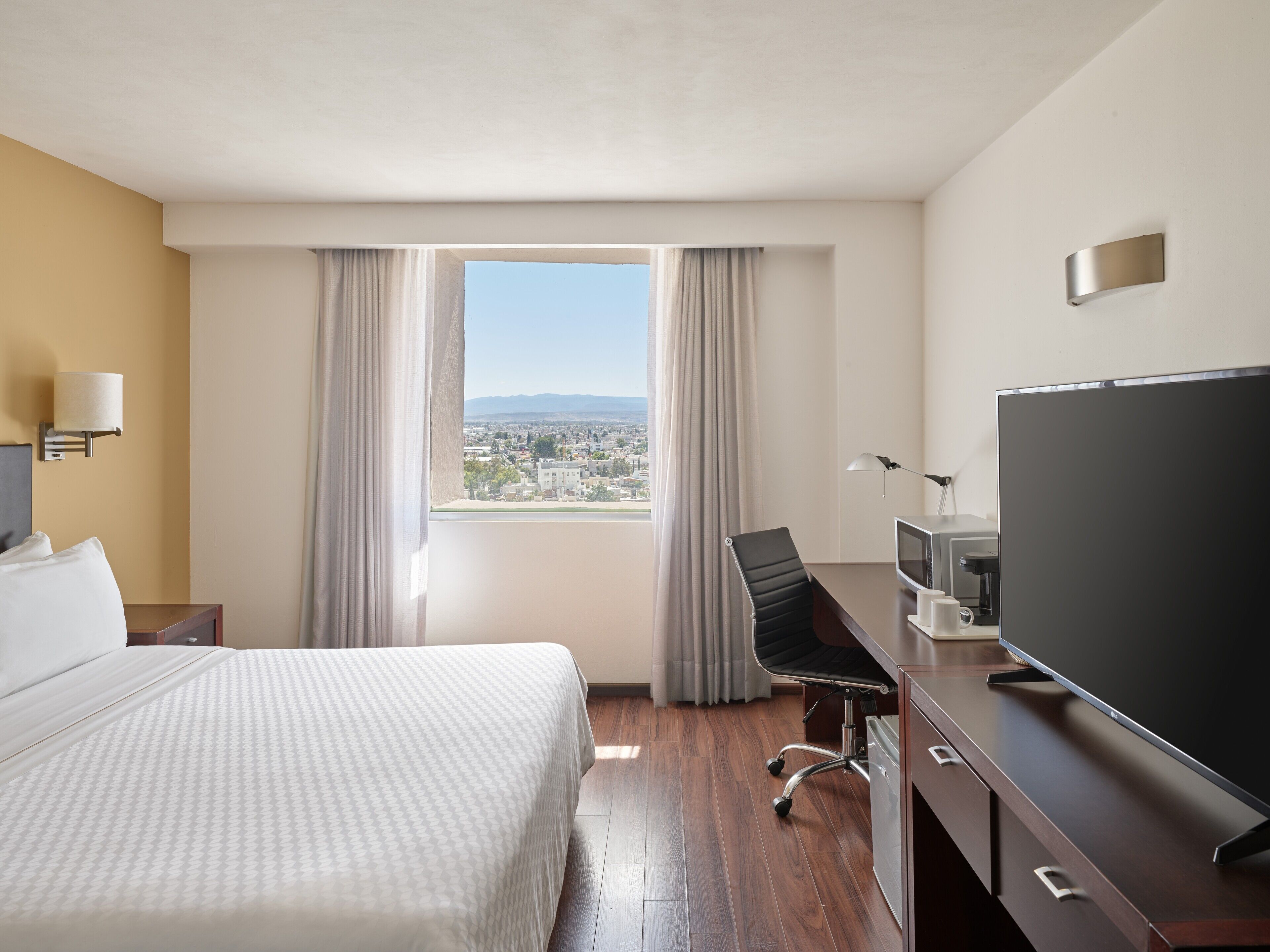 In-room safe, desk, laptop workspace, iron/ironing board