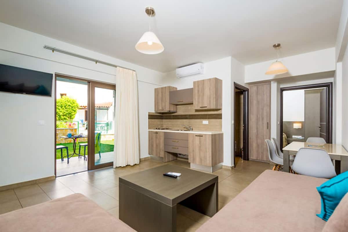 superior apartment | living area | tv