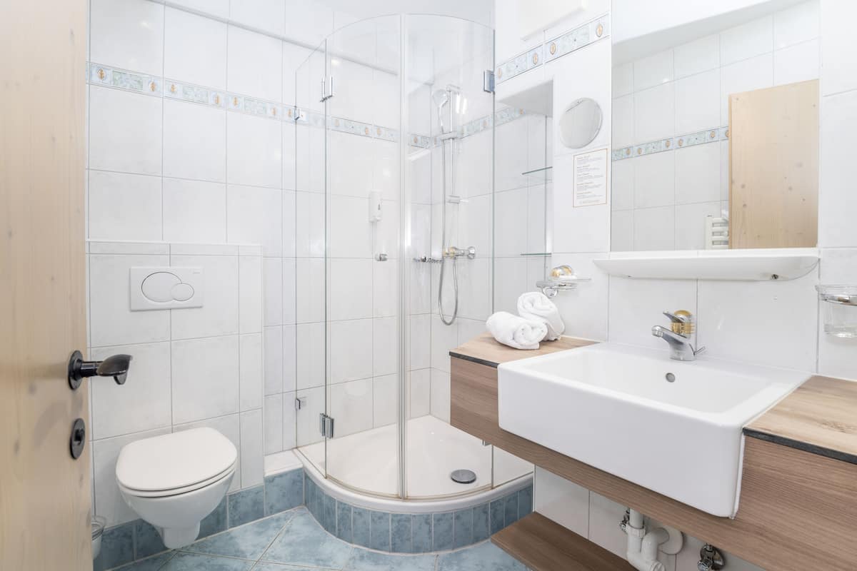 eco-friendly toiletries, hair dryer, bathrobes, towels