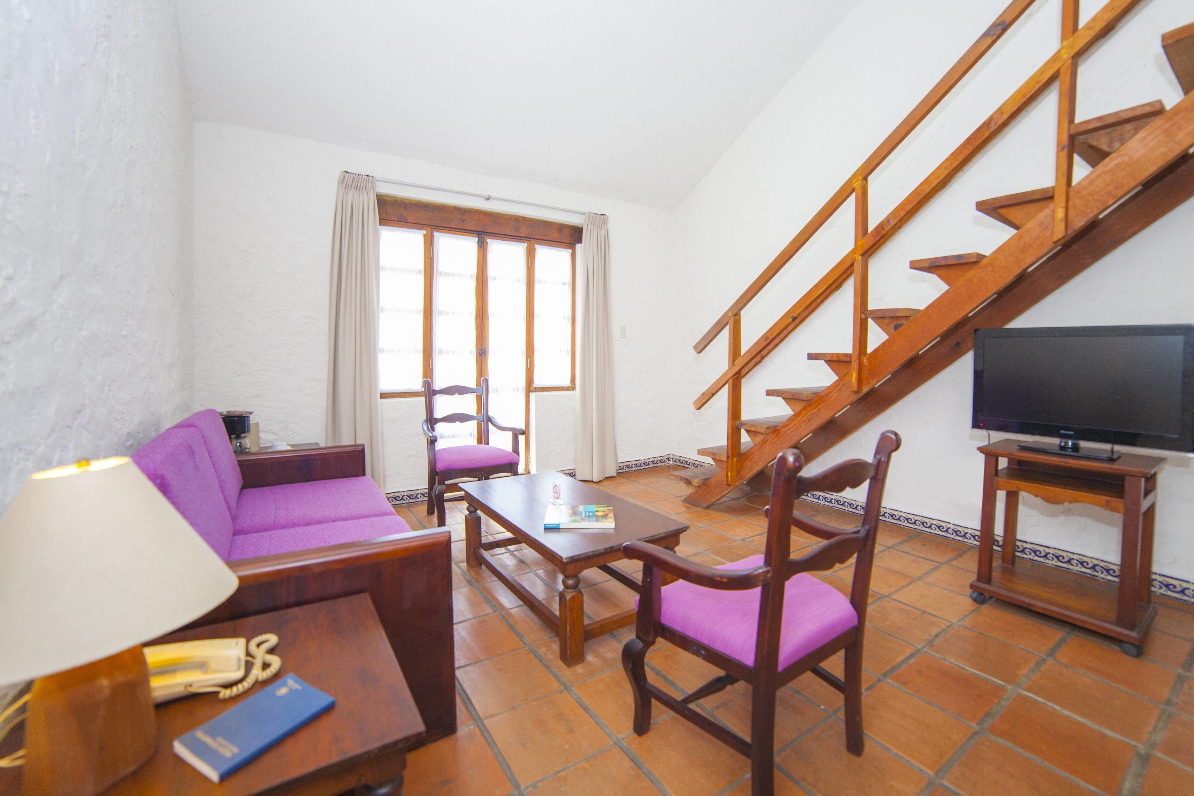 junior suite | living area | 32-inch led tv with cable channels, tv, table football