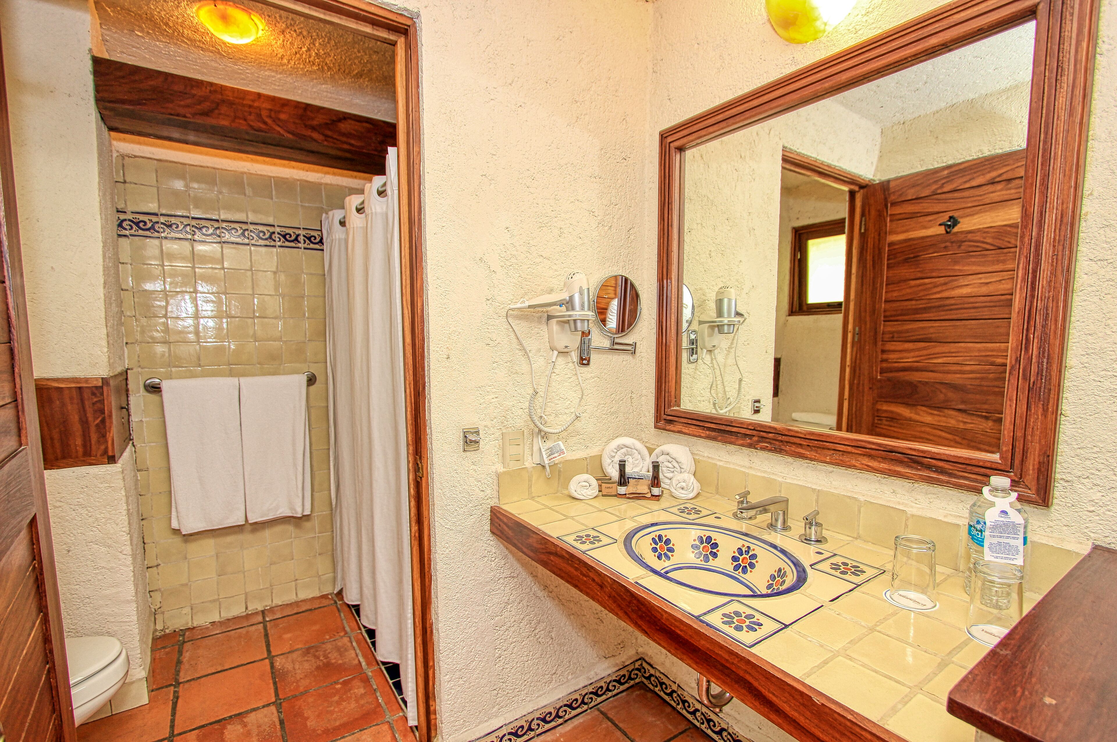 shower, free toiletries, hair dryer, towels