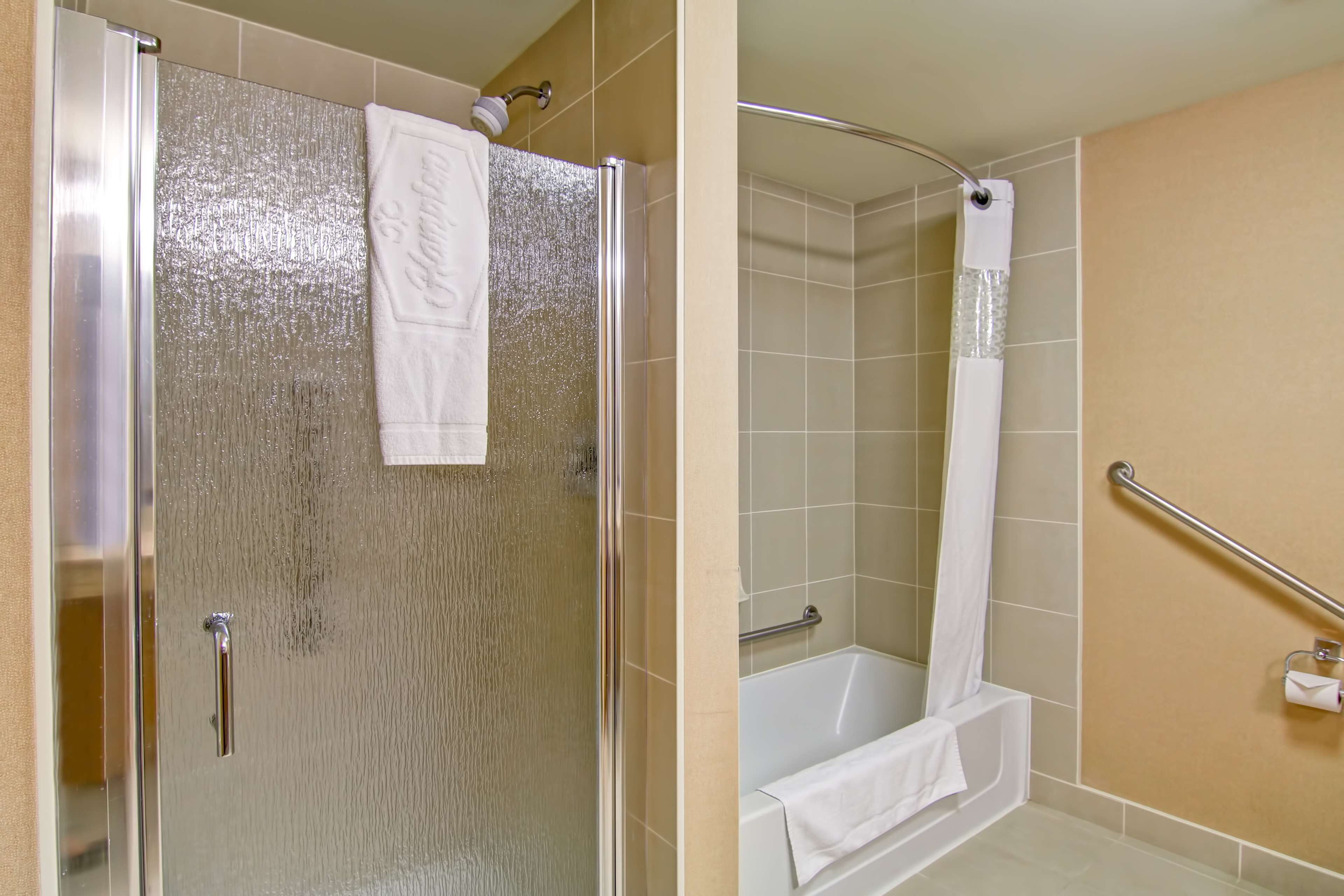 two queen beds non smoking | bathroom | combined shower/bathtub, hydromassage showerhead, free toiletries