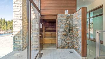 Enter a warm and inviting space with a mix of natural stone and wood elements.
