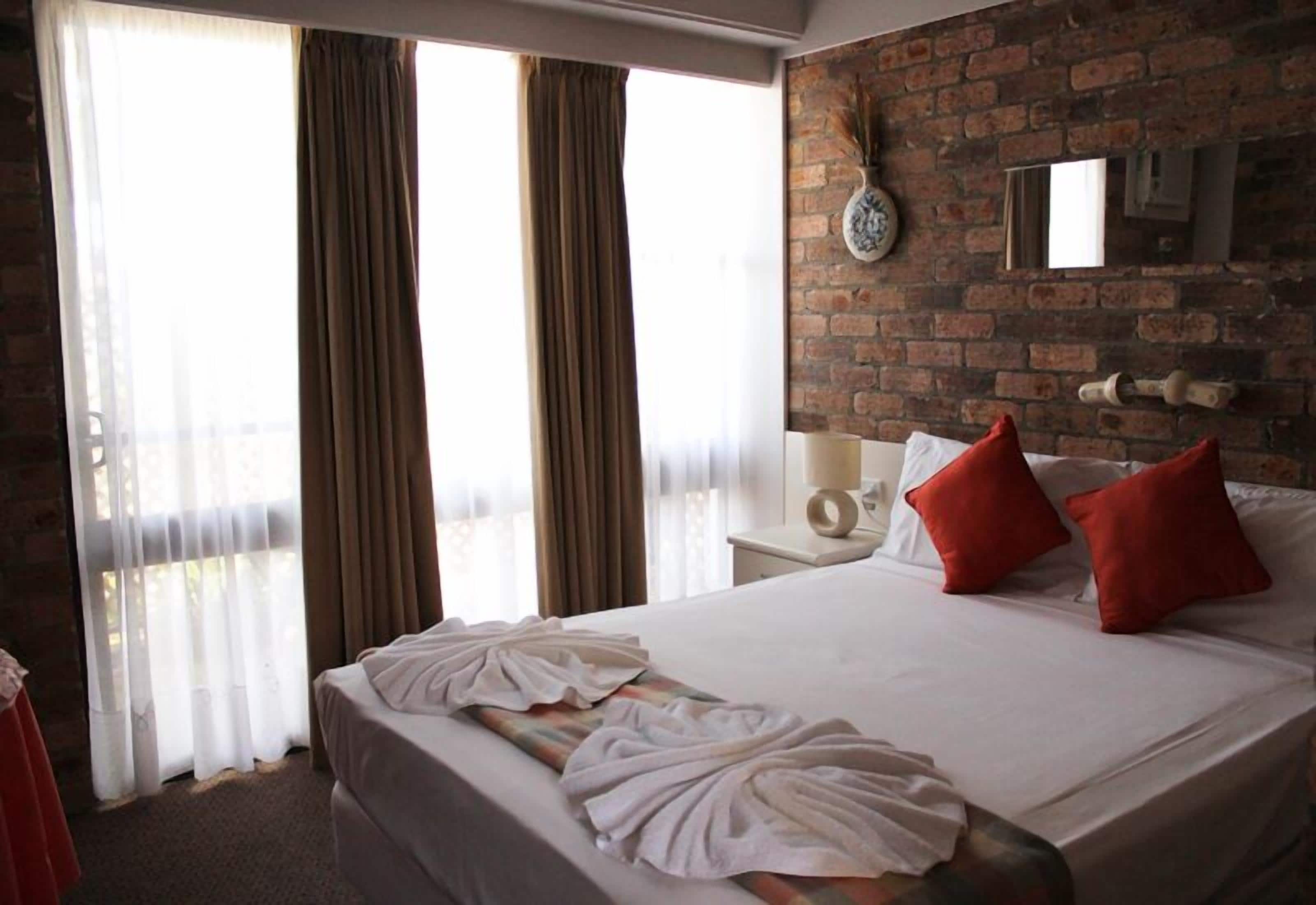 Blackout curtains, iron/ironing board, free WiFi, bed sheets