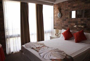 Blackout curtains, iron/ironing board, free WiFi, bed sheets