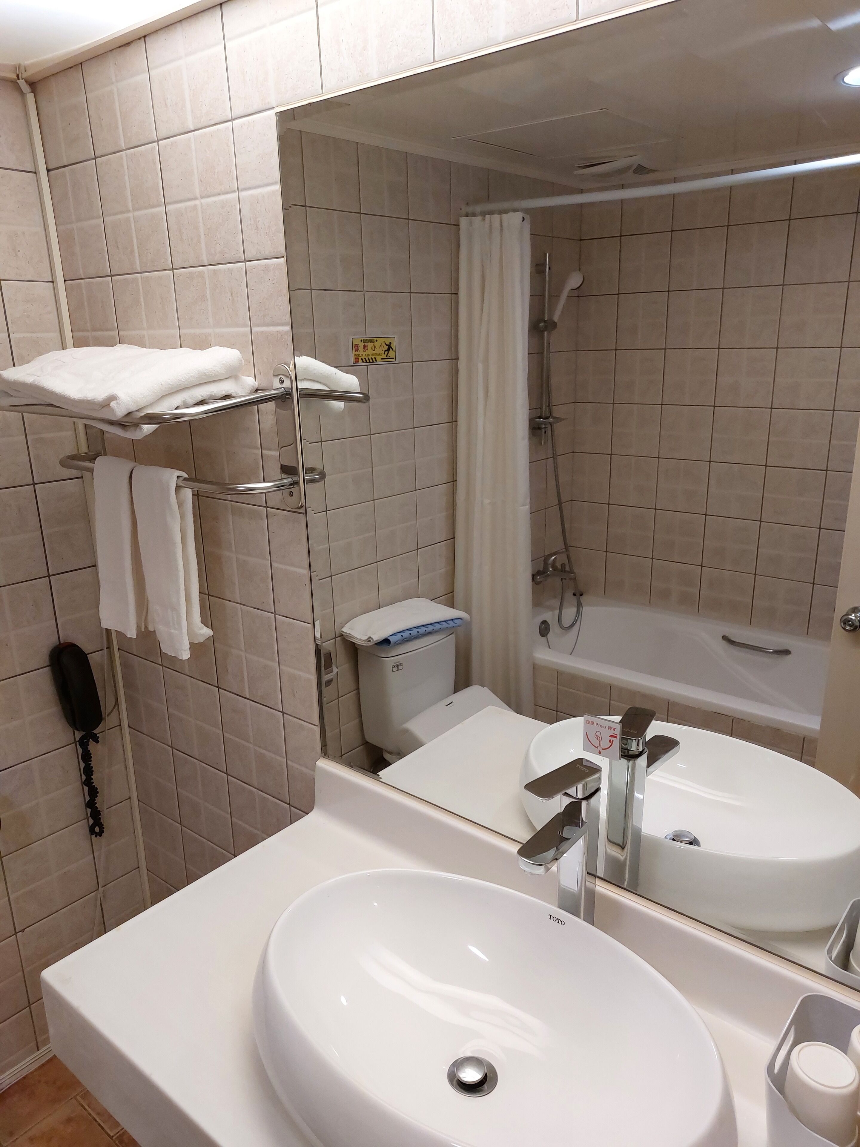 scandi design room | bathroom | hair dryer, slippers, electronic bidet, towels