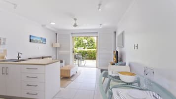 1 Bed Studio Apartment with River View | Living area | Flat-screen TV, DVD player