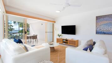 3-Bedroom Riverfront Apartment | Living area | Flat-screen TV, DVD player