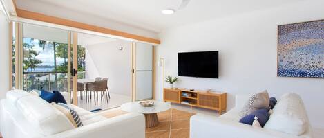 3-Bedroom Riverfront Apartment | Living area | Flat-screen TV, DVD player