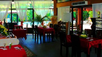 Breakfast, lunch, dinner served; pool views