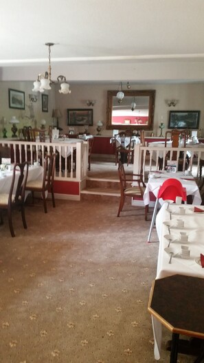 Breakfast, lunch, dinner served; local cuisine 