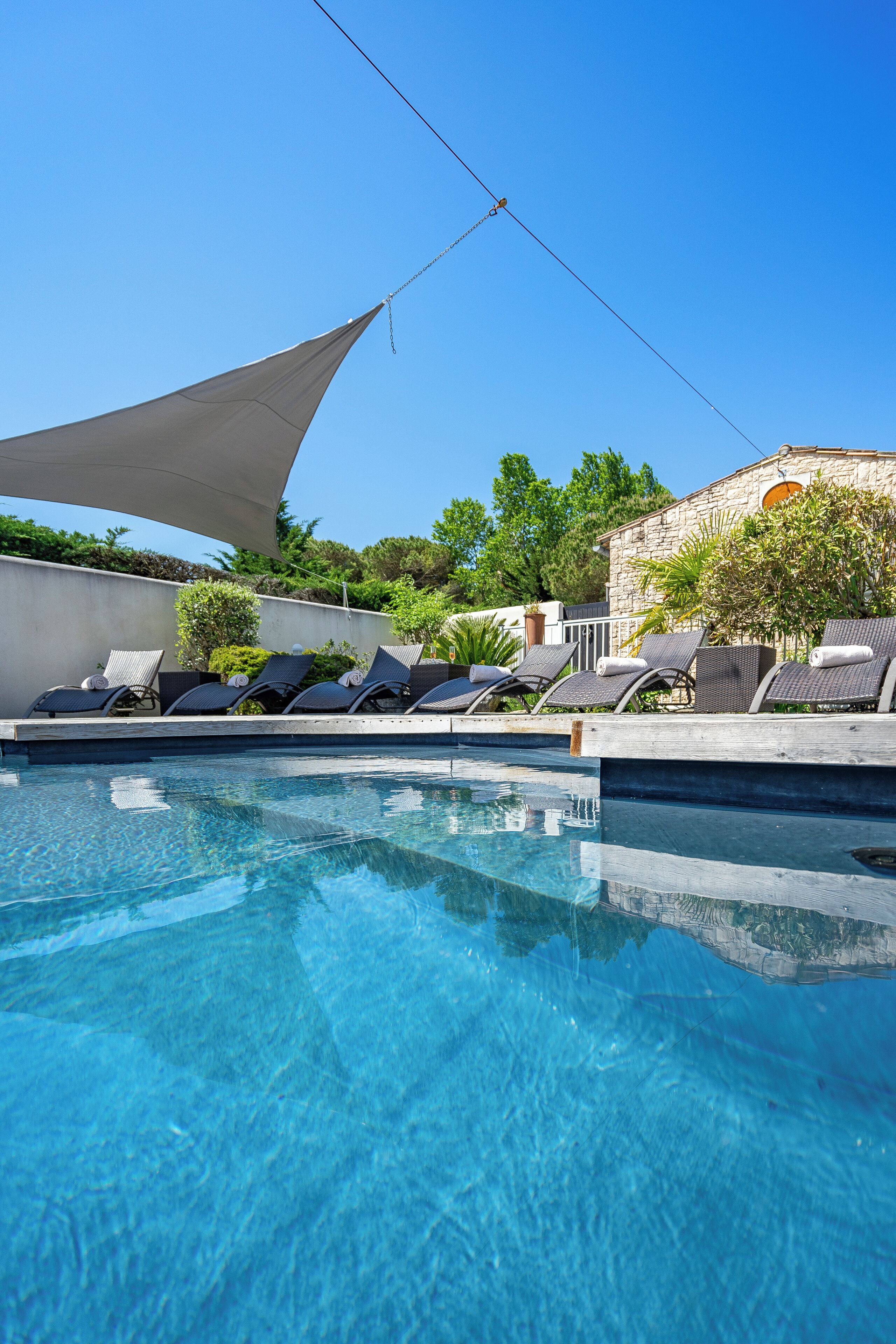 2 outdoor pools, pool umbrellas, pool loungers