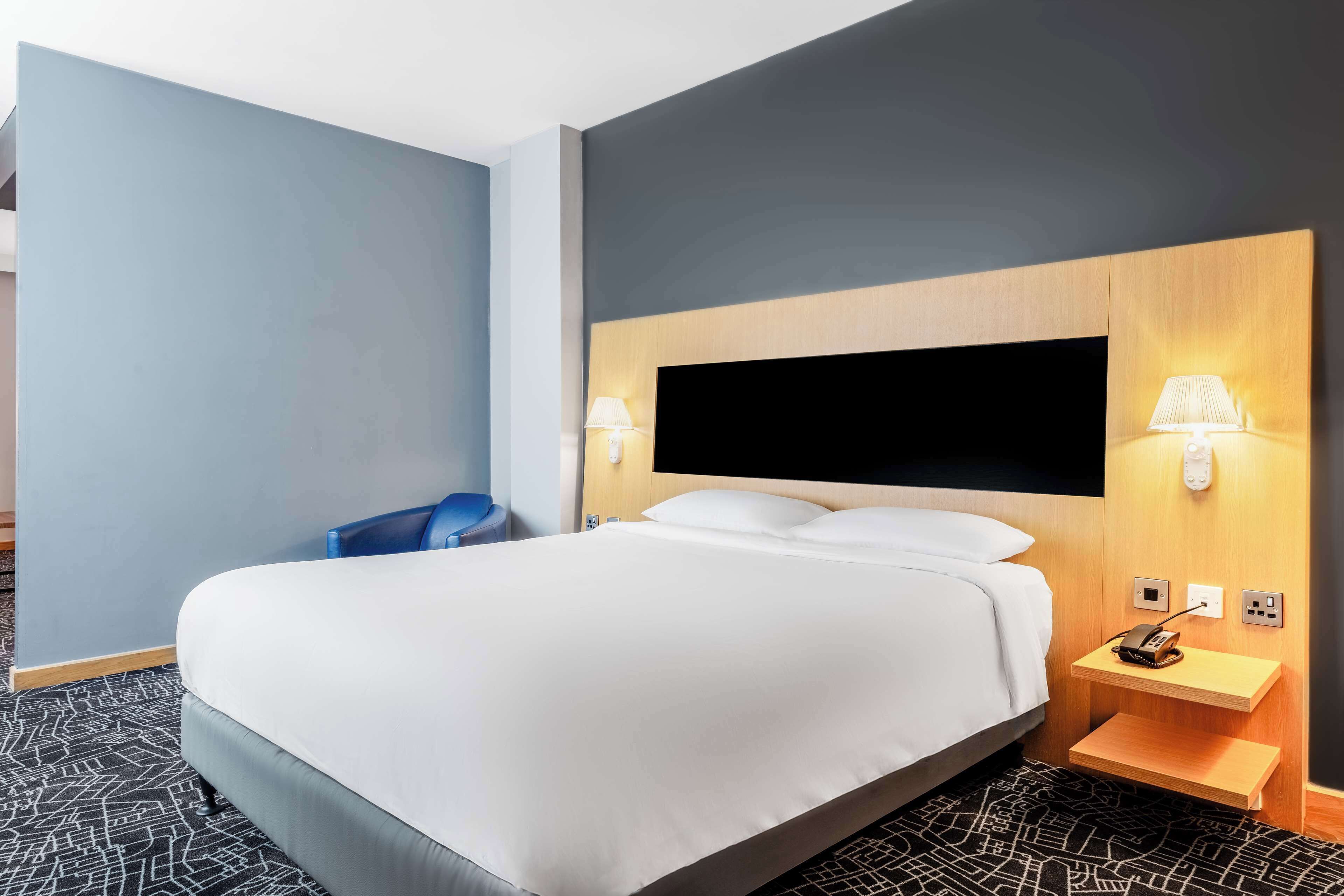 junior suite | in-room safe, desk, blackout curtains, soundproofing