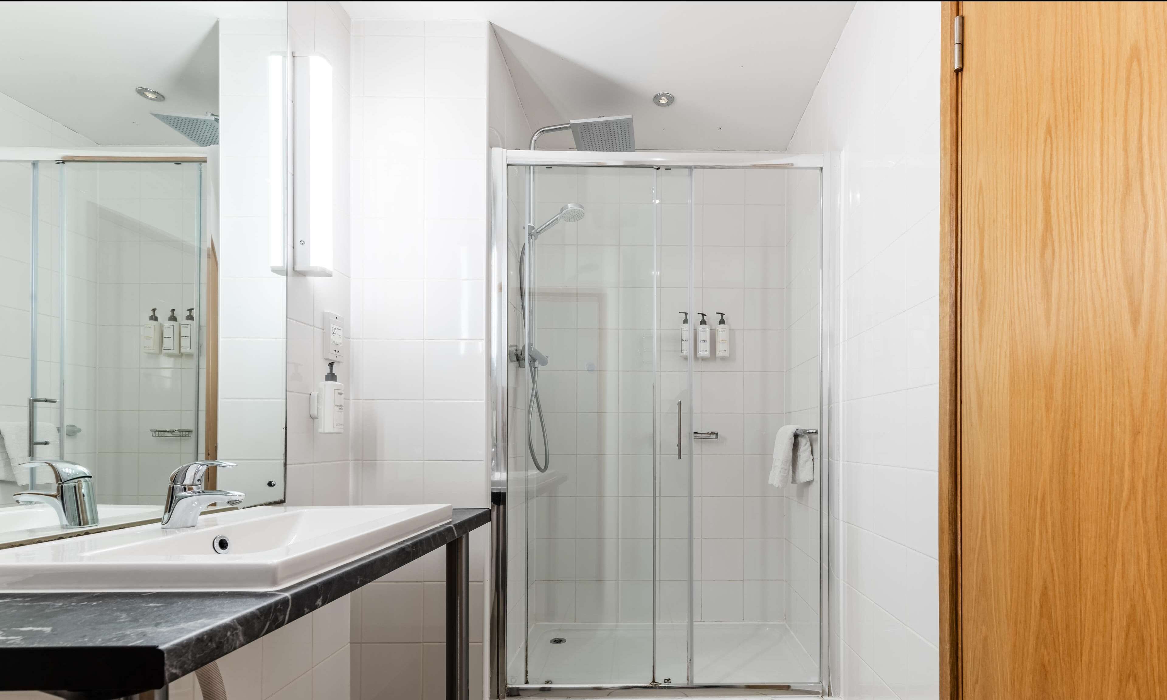 standard room | bathroom | shower, free toiletries, hair dryer, towels
