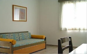 Suíte, 1 quarto | Área de estar