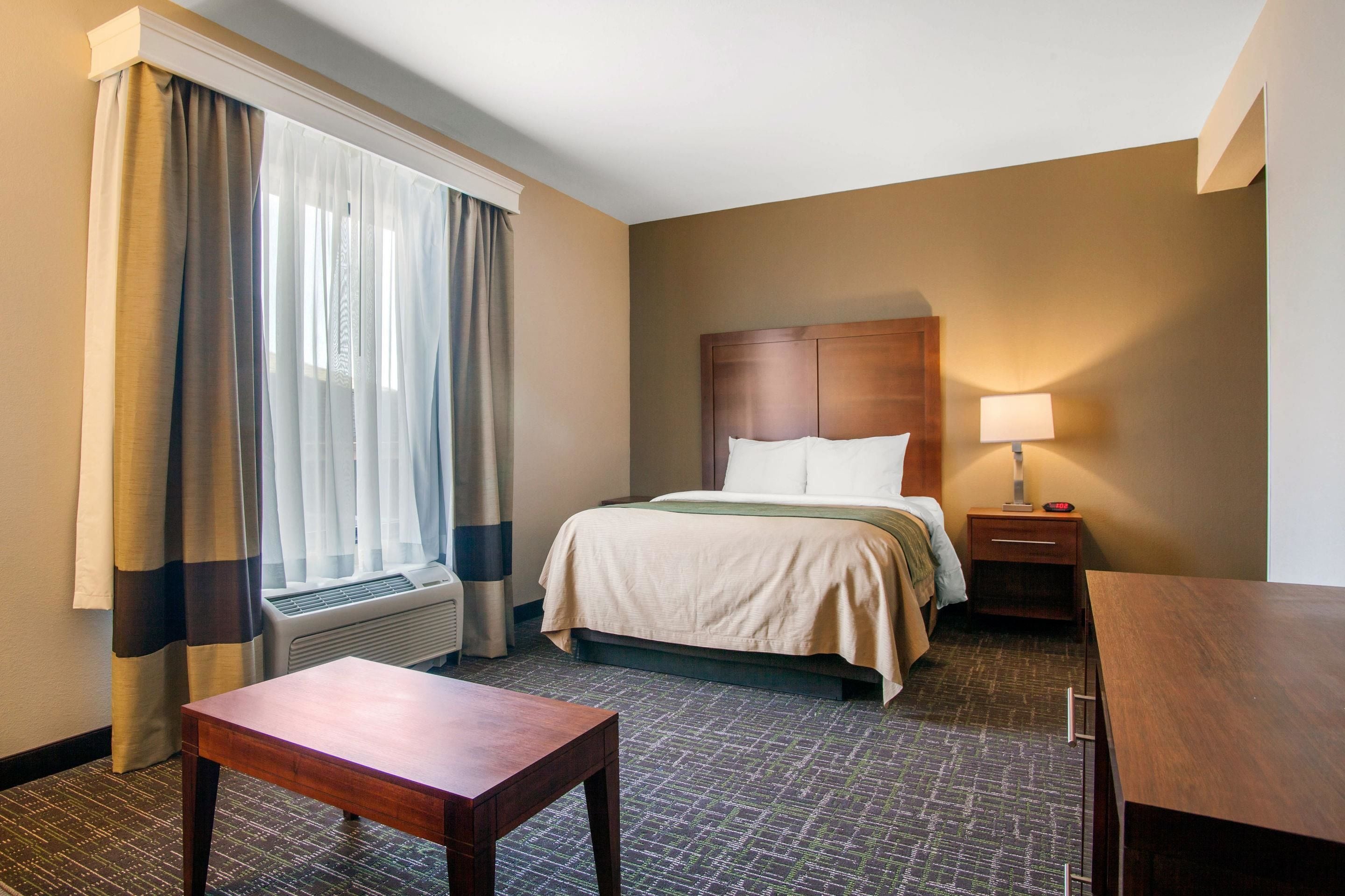 down duvets, pillow-top beds, desk, blackout curtains