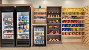 A vending area with various snacks and drinks. - Holiday Inn Express & Suites Akron Regional Airport Area by IHG (Akron)