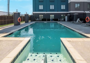 Seasonal outdoor pool, pool loungers