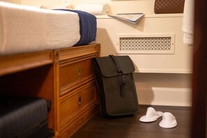 Luxe beddengoed, een kluis op de kamer, een strijkplank/strijkijzer