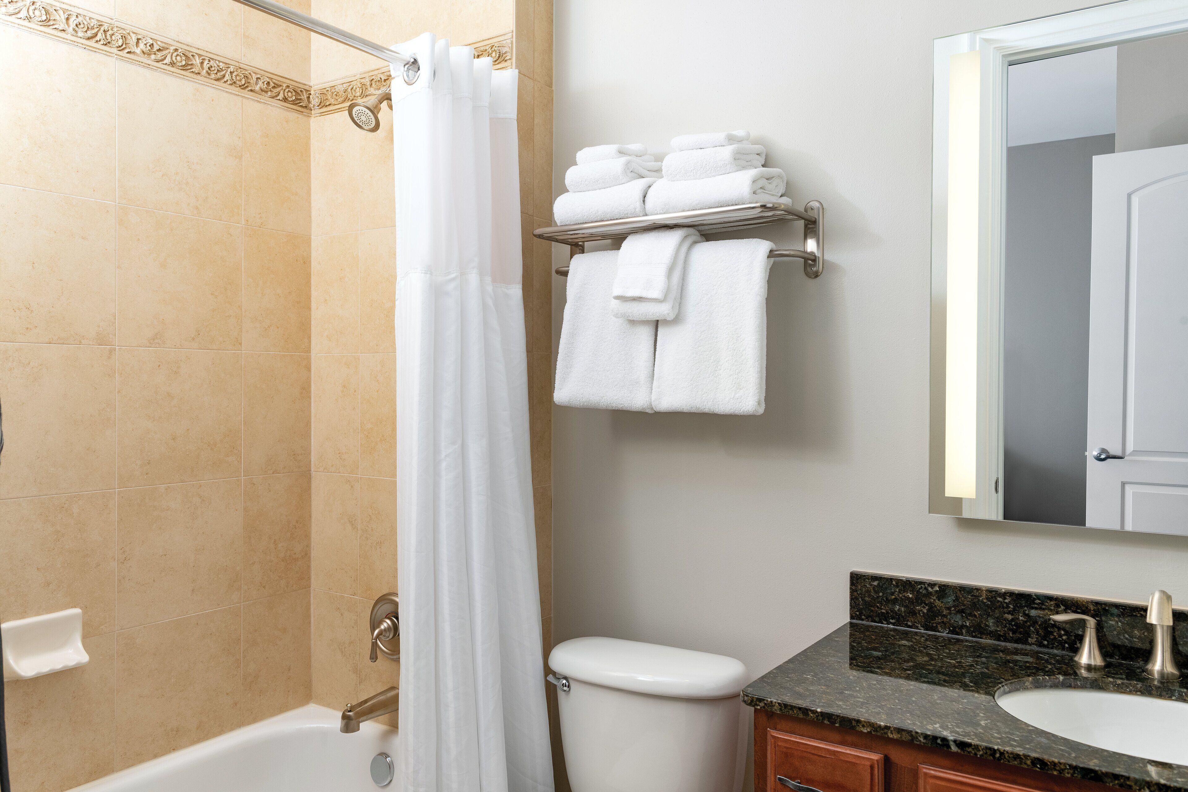 combined shower/bathtub, free toiletries, hair dryer, towels