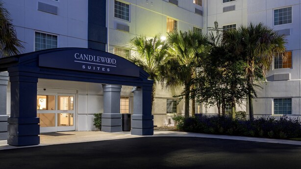 A hotel entrance with a sign reading "CANDLEWOOD SUITES" and a modern building facade. - Candlewood Suites Bluffton-Hilton Head by IHG (Bluffton)