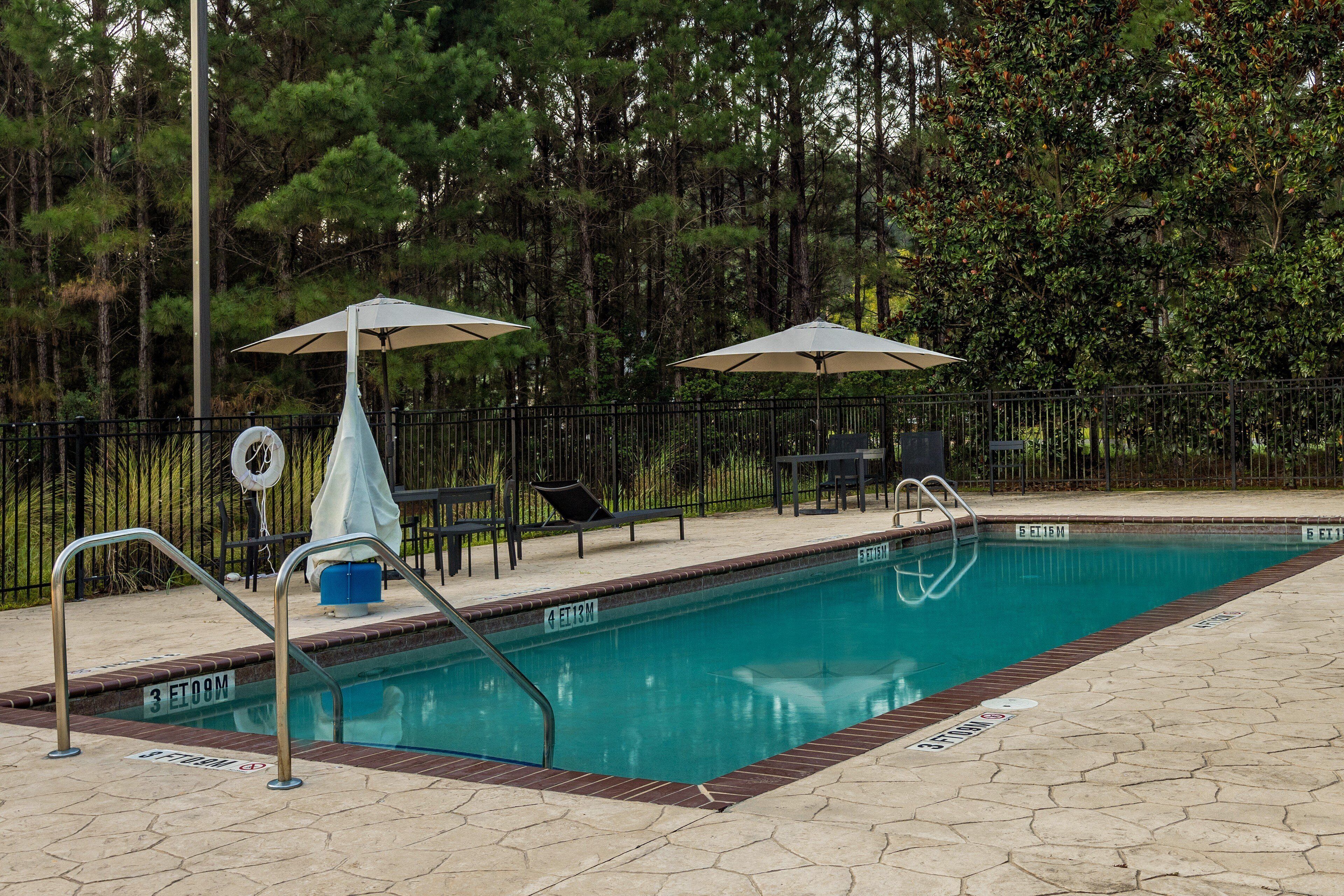 outdoor pool, pool umbrellas, pool loungers