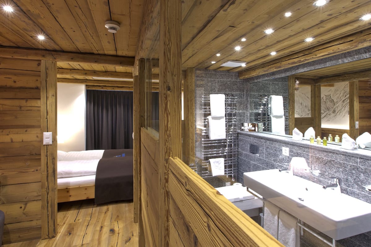 junior suite | 1 bedroom, in-room safe, desk, laptop workspace