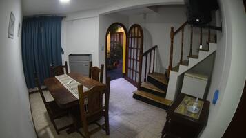 Family Quadruple Room, 1 Bedroom | Living area | 32-inch Smart TV with satellite channels