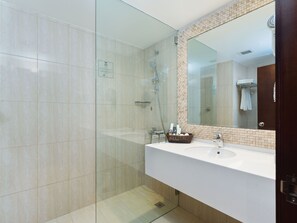 Shower, free toiletries, hair dryer, slippers