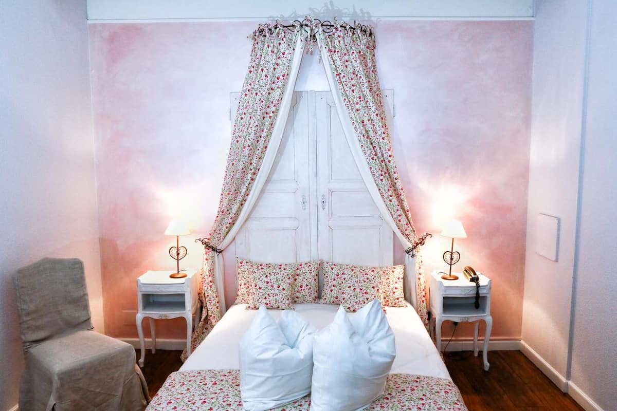 Family Room | Premium bedding, blackout curtains, free WiFi, bed sheets