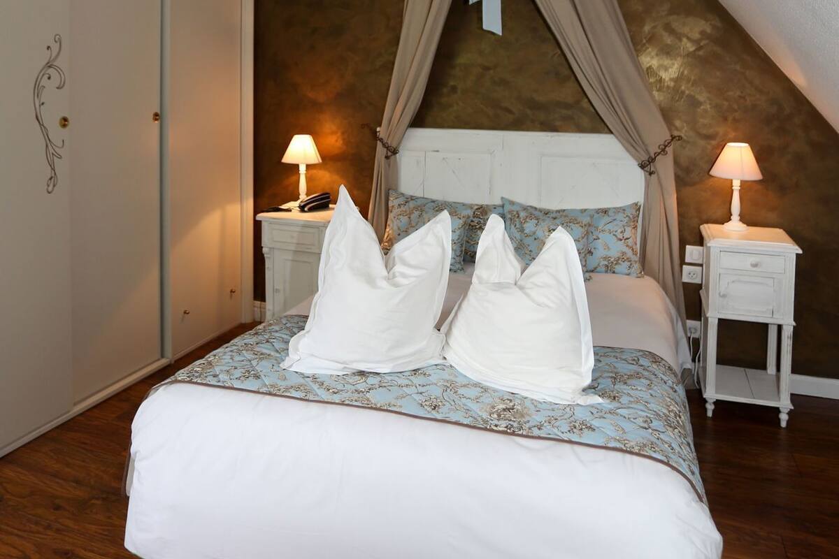 Iron/ironing board, free cots/infant beds, free WiFi, bed sheets