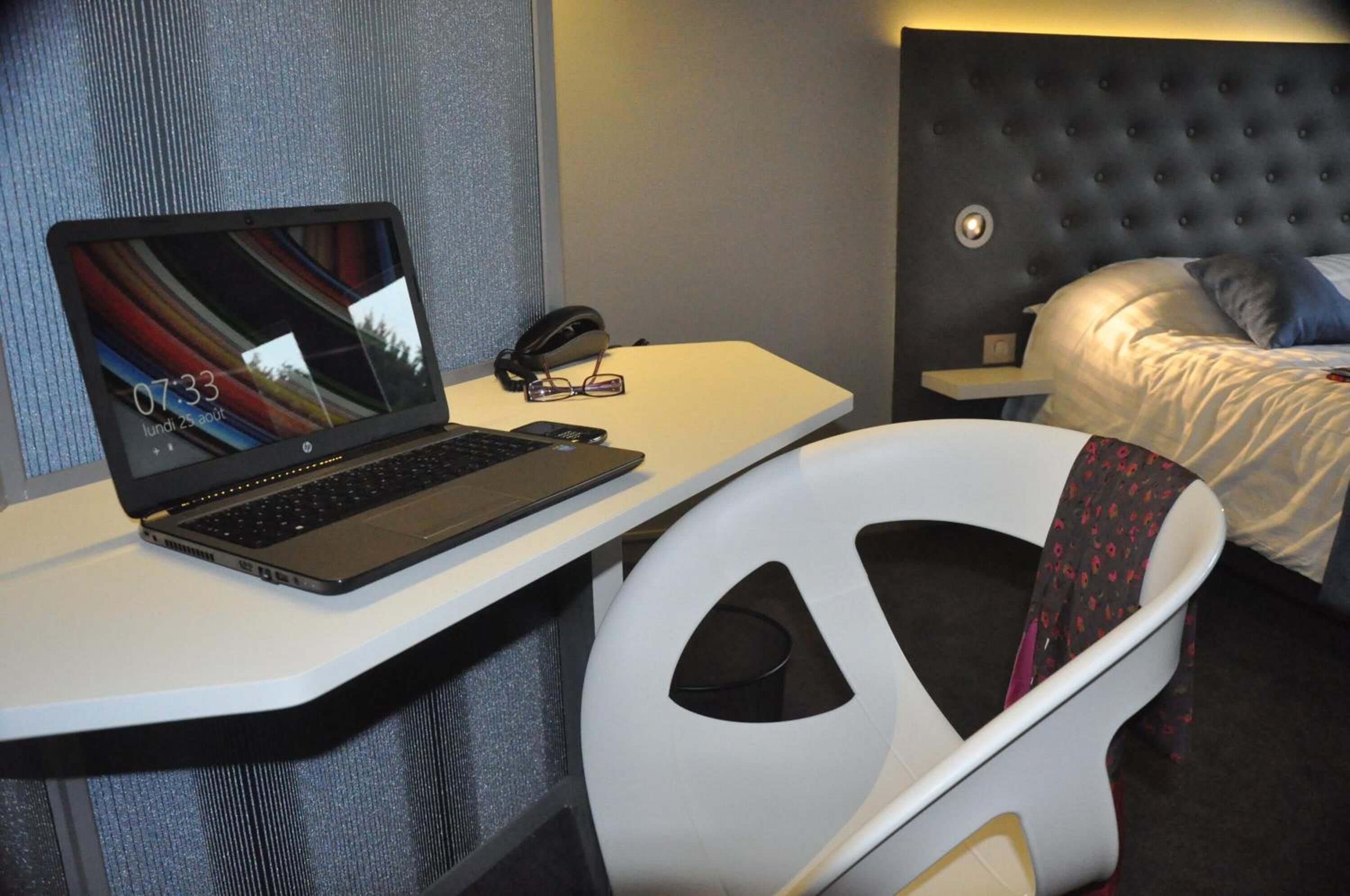 premium bedding, desk, blackout curtains, soundproofing