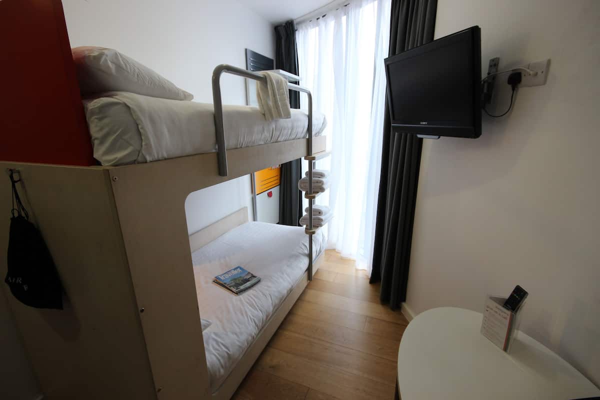 standard twin room (bunk beds) | 1 bedroom, desk, laptop workspace, blackout curtains