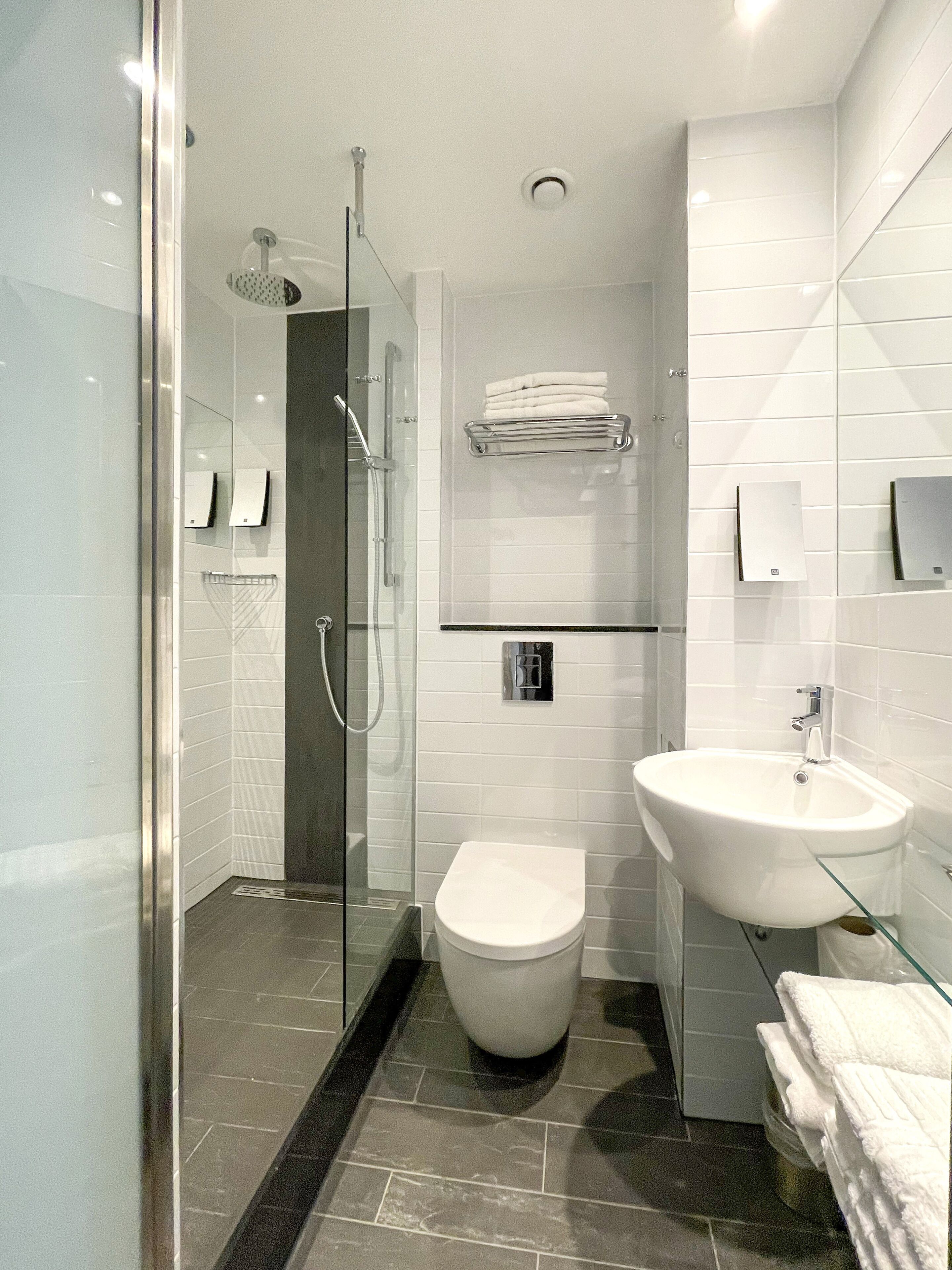 family room | bathroom | shower, free toiletries, hair dryer, towels
