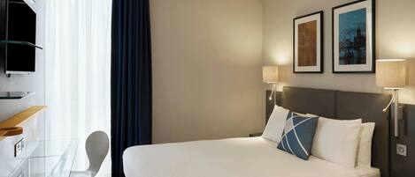 Efficient Double | Desk, laptop workspace, blackout drapes, soundproofing