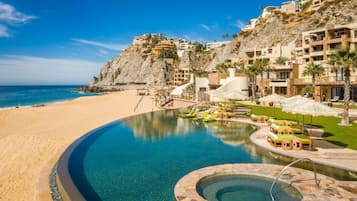 3 outdoor pools, pool umbrellas, pool loungers