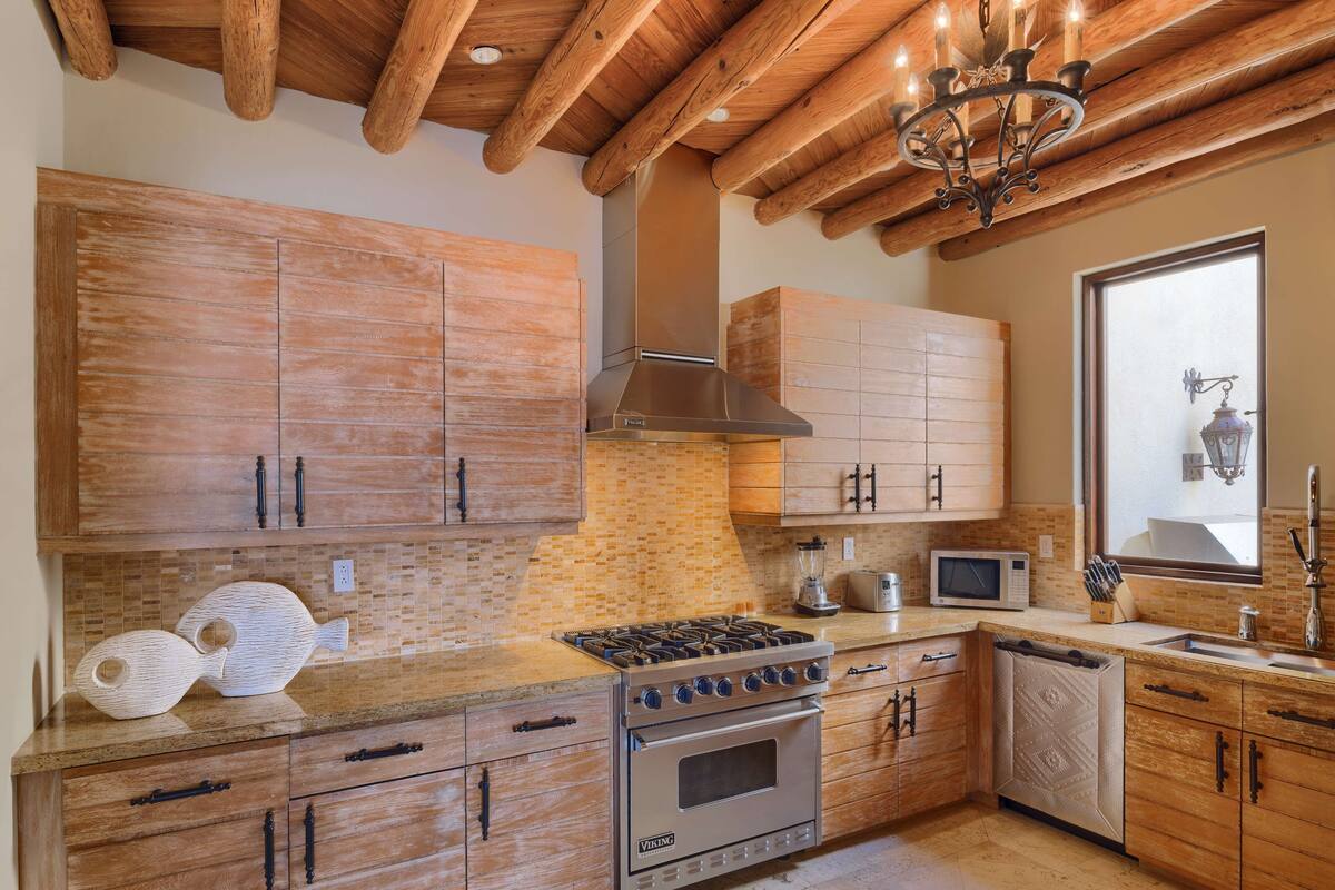 fridge, espresso maker, high chair, dining tables