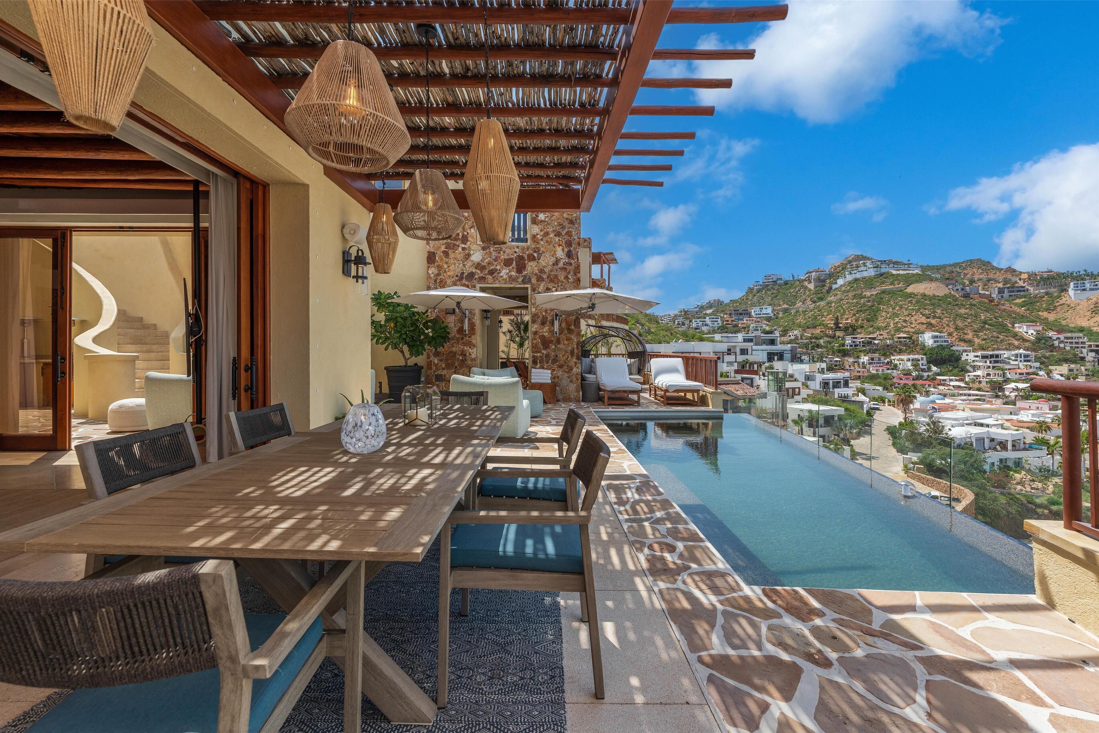 4 bedroom pedregal private home mountain view | living area | tv, fireplace, pay films