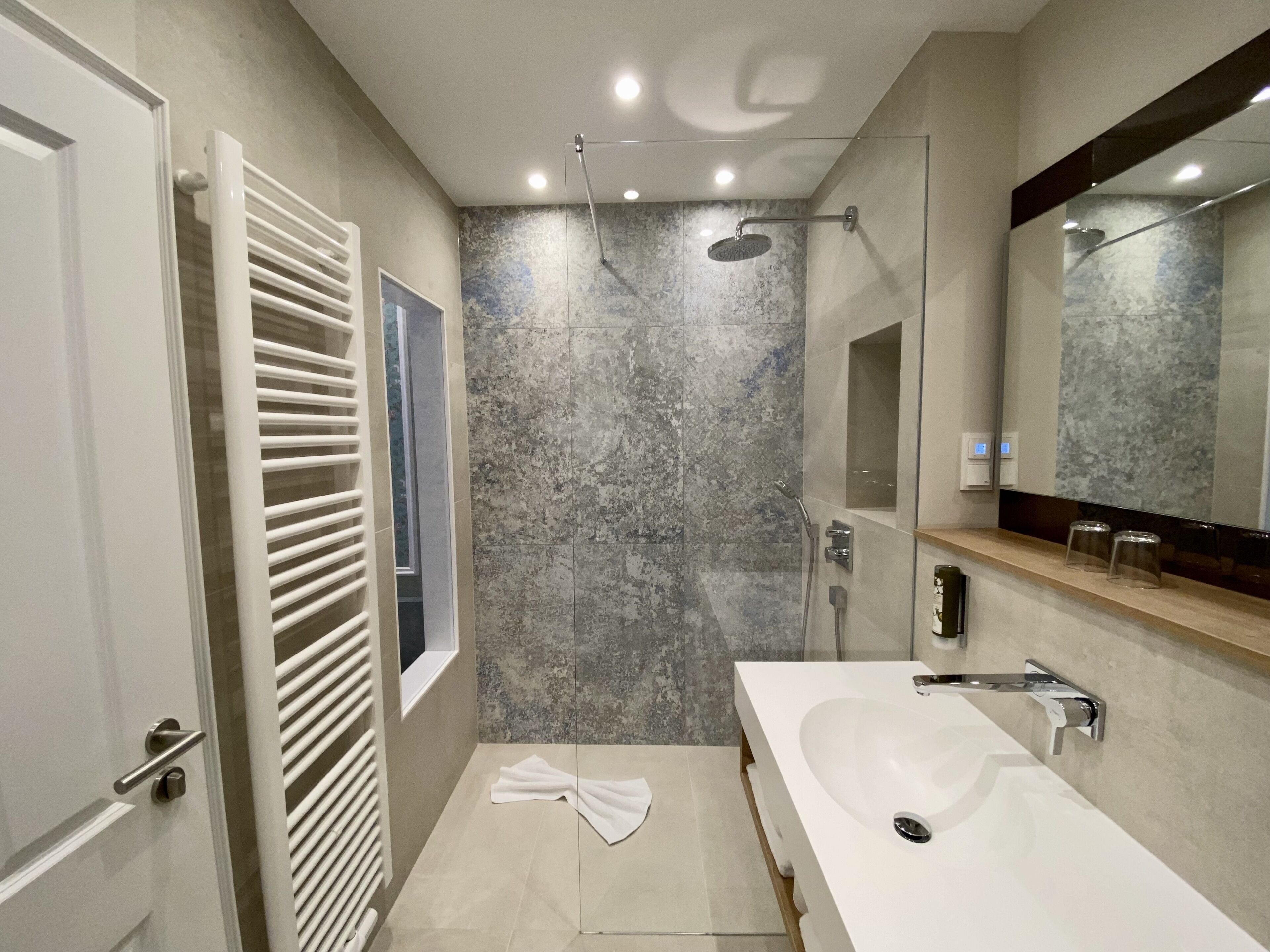 deluxe double room | bathroom | shower, free toiletries, hair dryer, towels