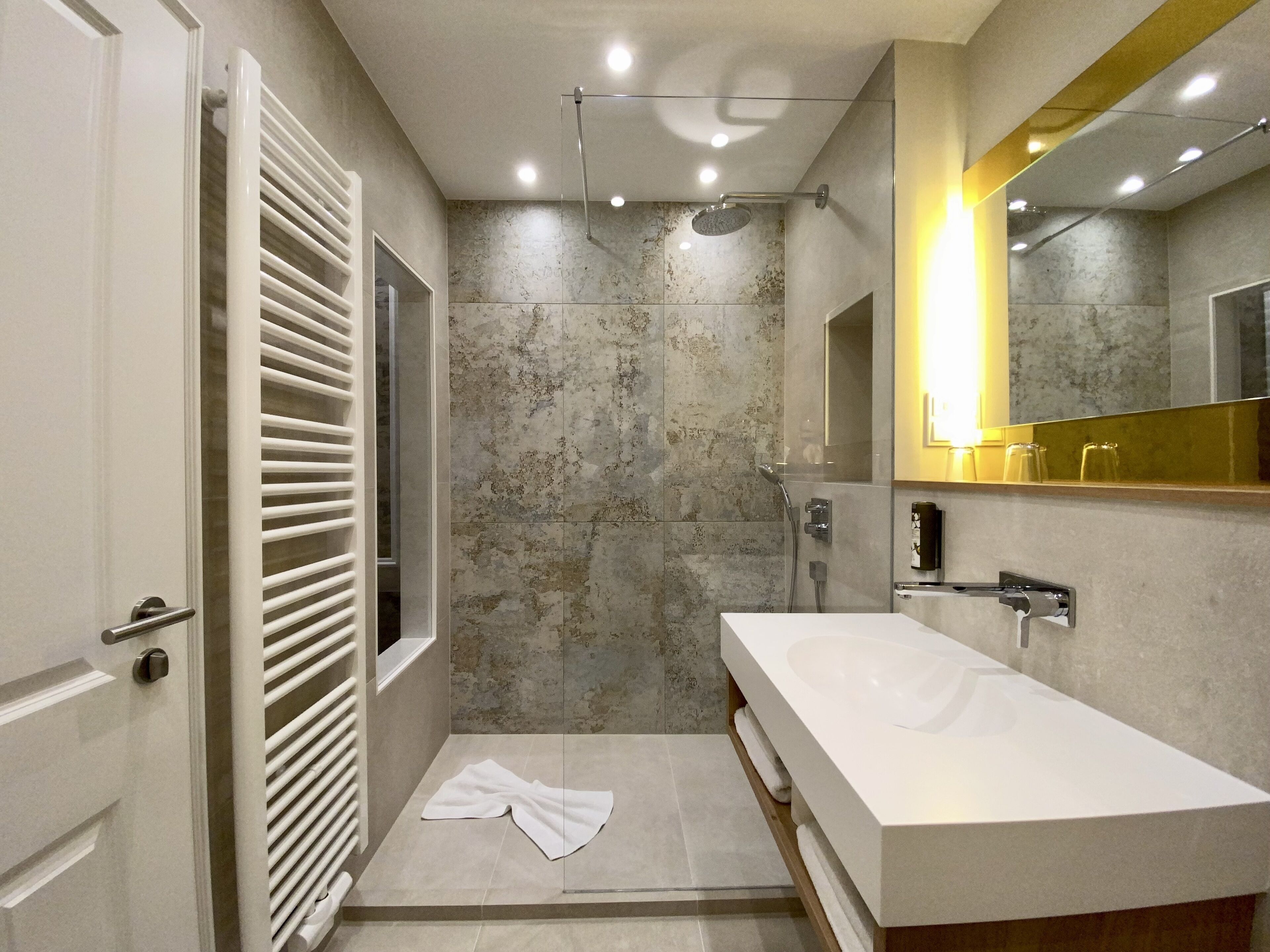 deluxe double room | bathroom | shower, free toiletries, hair dryer, towels