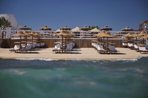 Free beach shuttle, sun loungers, beach umbrellas, beach towels